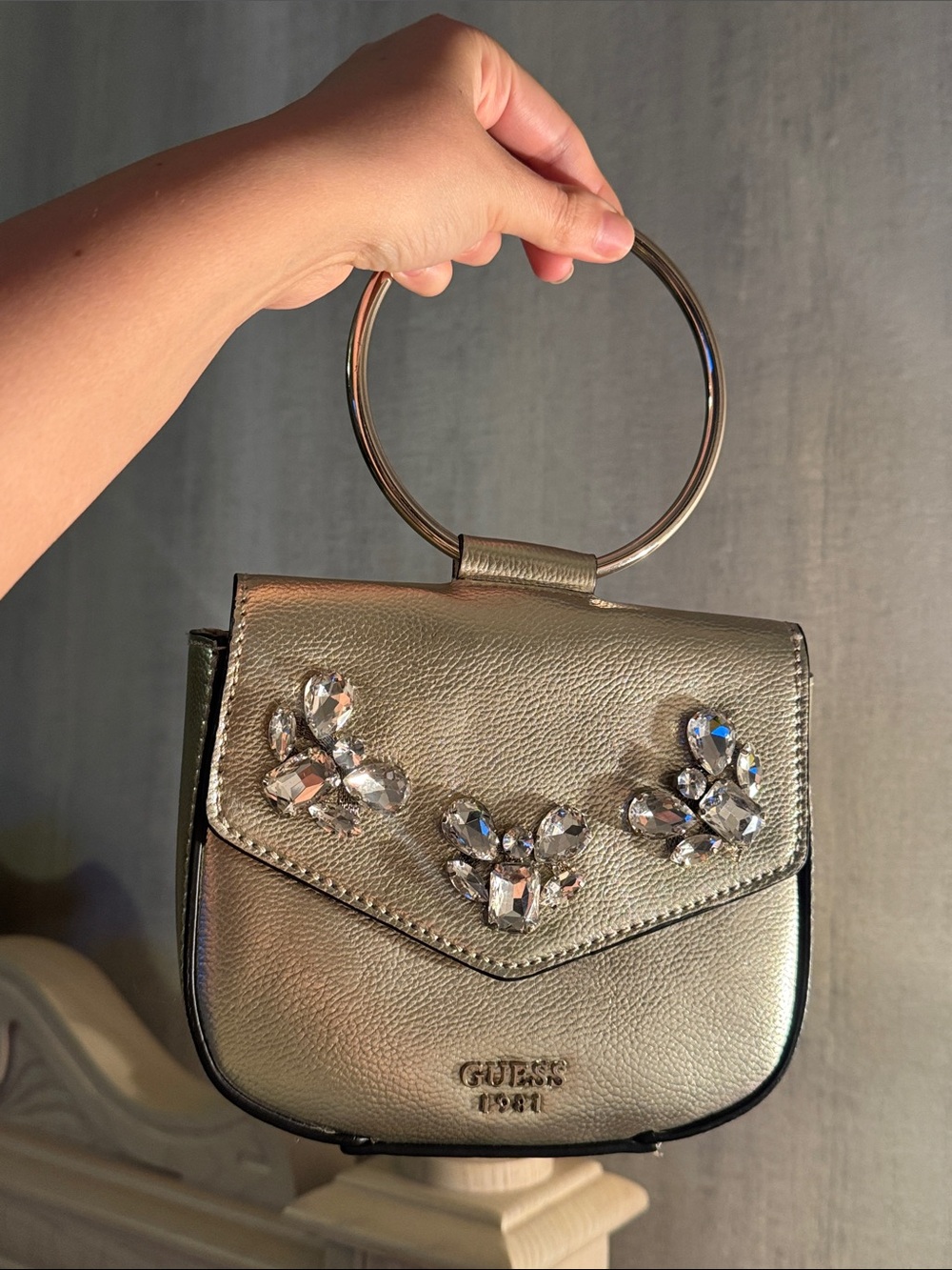 GUESS Metallic Gold Mini Ring-Handle Crossbody with Crystal Accents